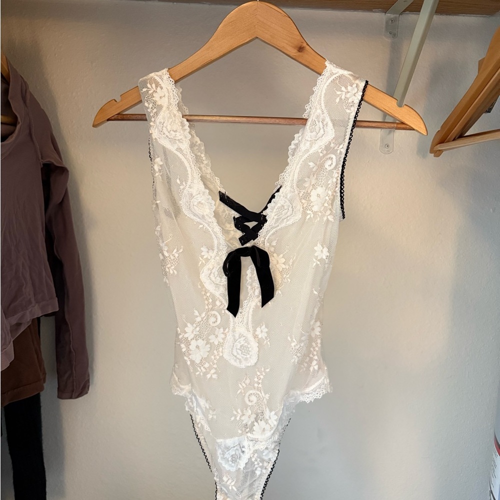 Victoria’s Secret Ivory Lace Bodysuit with Black Ribbon Detail